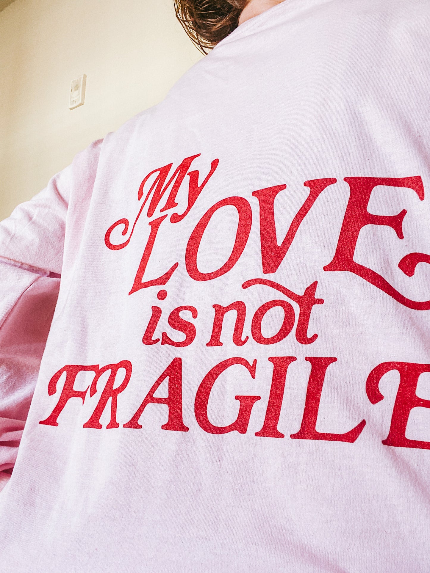 'MY LOVE IS NOT FRAGILE' - LONG SLEEVE TEE